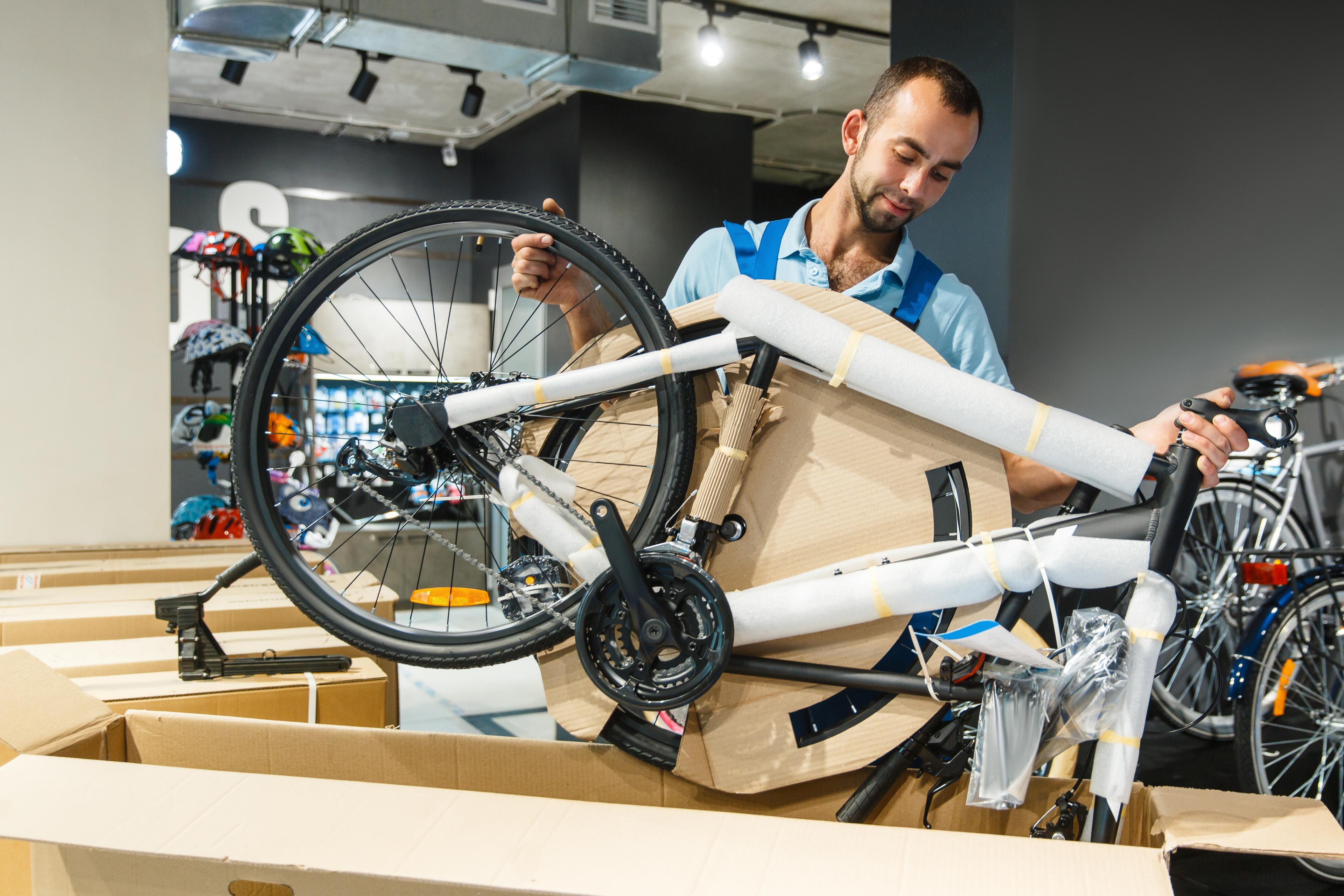 Man packing bicycle